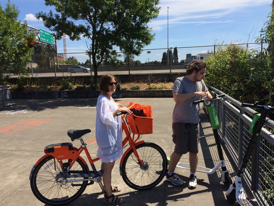 We rented scooters and a baike, rode all the way to Reed College.